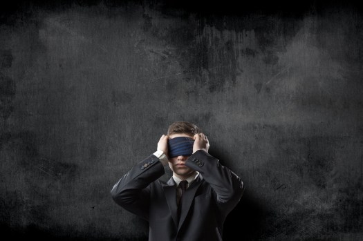 Blindfold businessman