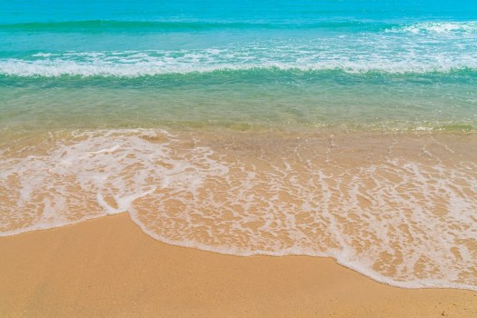 Wave of sea on the sand beach