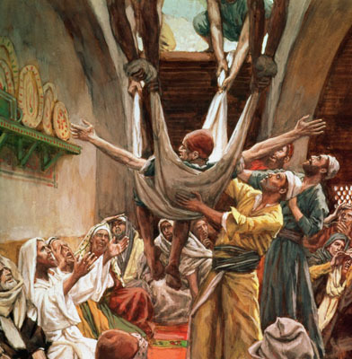 Glowing sunset with cross and some cheering people